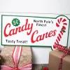 23.6” Metal Holiday North Pole’s Finest Candy Canes Wall Sign